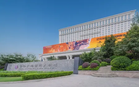 Huayang Plaza Hotel Отели в г. Лоян