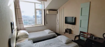 Tieli Chaoyuan Express Hotel Отели в г. Тьели