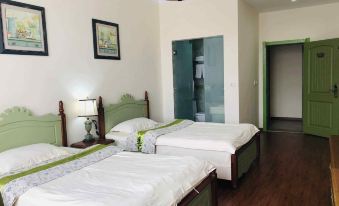 Luoping Huaying Image Theme Inn