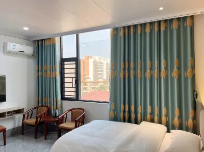 Yemingzhu Business Hotel Hôtels à proximité de la Binyang Railway Station