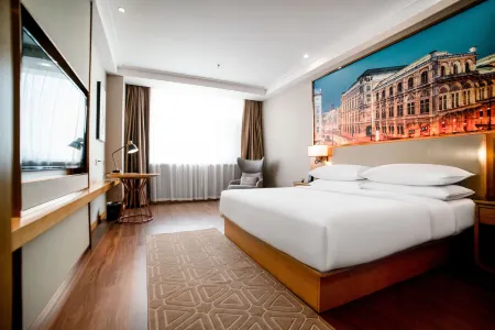Vienna International Hotel (Jilin Street Railway Station) Отели рядом с достопримечательностью «Jihai Railway Terminal Former Site»