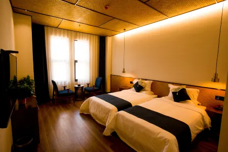 Jinyan'an Guanshe Homestay Отели рядом с достопримечательностью «Yan'an Vocational and Technical College»