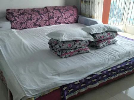 Laoting Aijia Farm House Отели в г. Лэтин