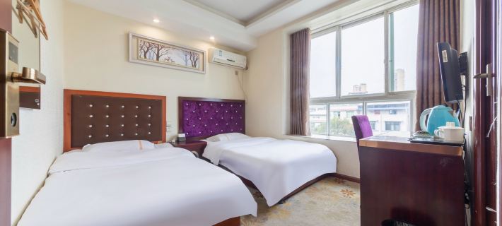 Wenchang Guli Business Hotel Hotels in Zitong