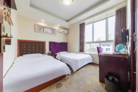 Wenchang Guli Business Hotel Отели рядом с достопримечательностью «Sichuan College of Culture and Art (Qiu Campus)»
