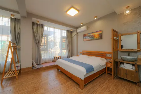 Xinping Xiaoguaijia Inn