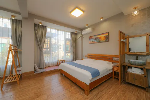 Xinping Xiaoguaijia Inn