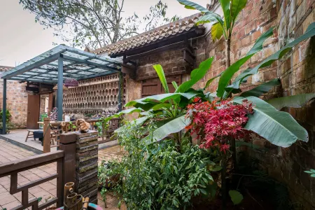 Ganfu Yard Homestay Отели рядом с достопримечательностью «Wanzai Ancient City»