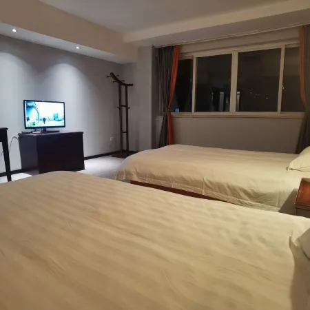 Sanmen Jinsenberland Business Hotel