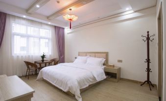 Yameng Xinyuan Inn