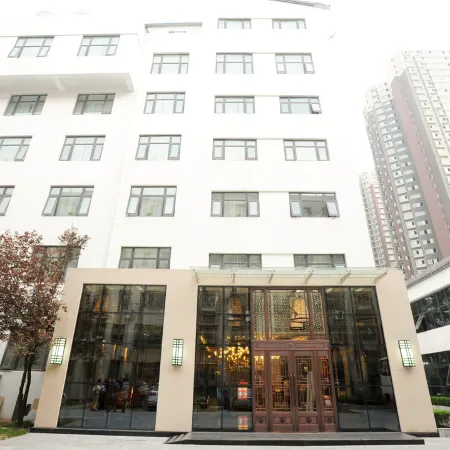 Wujia Yizhan Boutique Inn Отели рядом с достопримечательностью «Хэнаньский экзаменационный центр для экзаменов гражданской службы, образовательный центр Huatu»
