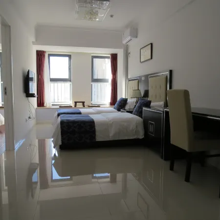 Guan County Hong Pu Traders Hotel