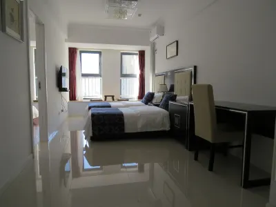 Guan County Hong Pu Traders Hotel