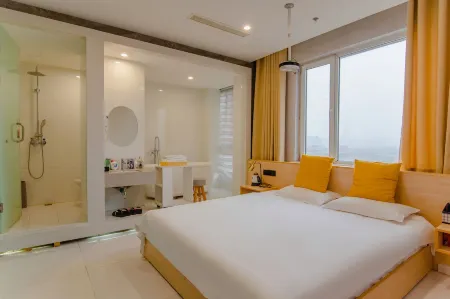 Aishang Jingpin Hotel (Anyang Huaqiang Xintiandi) Отели рядом с достопримечательностью «Henan Nursing Vocational Institute New Campus»