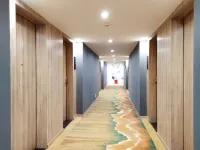 Yunduo Qingyu Hotel (Xingguo Railway Station Branch)