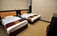 Shizong Aodu Hotel