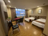 Qinggang Yixing Business Hotel - parcheggio