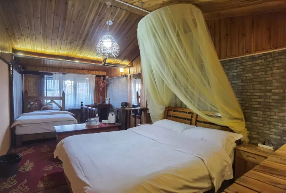 Delamu Youth Inn Zimmer Photos