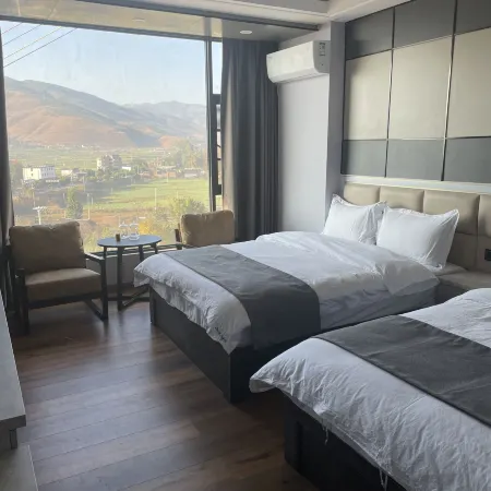 Dali Heqing Xiangyu Zhineng Inn (Huangpingzhen)