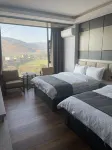 Dali Heqing Xiangyu Zhineng Inn (Huangpingzhen) - balcony