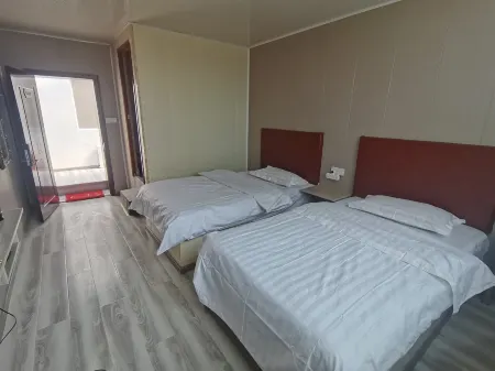 Cuoqin Jiawei Hotel Отели в г. Цоцинь