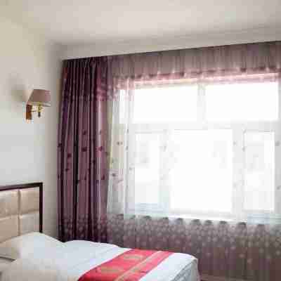 扎蘭屯阿強酒店 Rooms