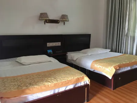 Thumb Hotel, Luchuan Отели рядом с достопримечательностью «Longchuan Gymnasium»