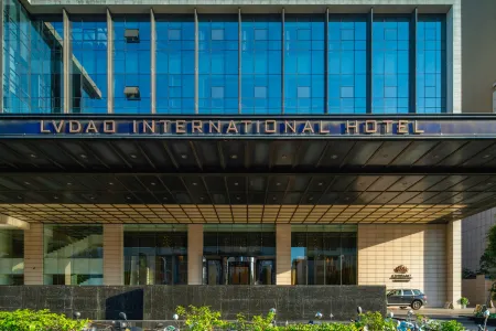 Lvdao International Hotel Отели рядом с достопримечательностью «Quanzhou Textile Garment Vocational Institute»