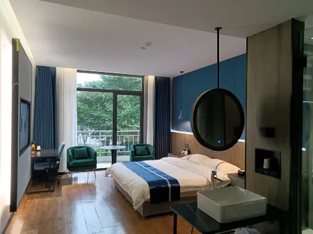 Minquan Baidu Business Hotel Отели рядом с достопримечательностью «Minquan National Forest»