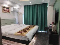 Lotus Xiaozhu Hotel - Inns