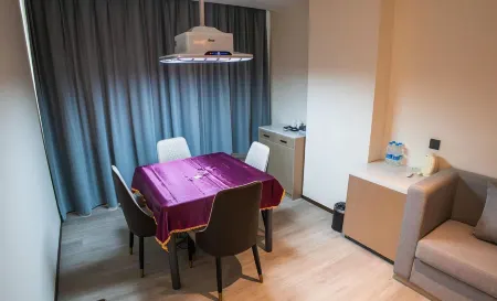 Zhongmao Yishang Hotel Отели в г. Цзиеси