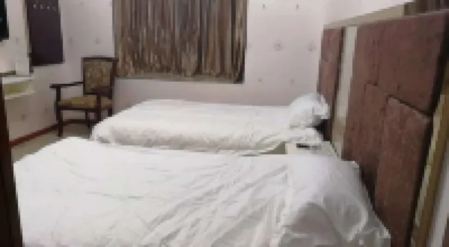 Quxian Tengda Business Hotel