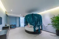 Xingyi Qigu Bokewan Hotel (Xingyi Mall Menglecheng Branch)