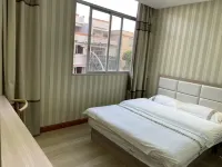 Jiangmen Yiwan Apartment with Elevator (Jiangmen East Railway Station Jianghai Square) - Inns