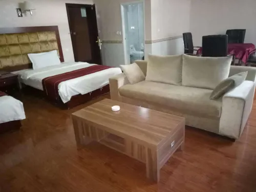 Xichang Shunda Business Hotel - إقامة ريفية