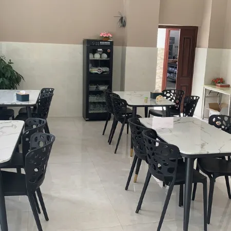 Muli Xinsheng Business Hotel