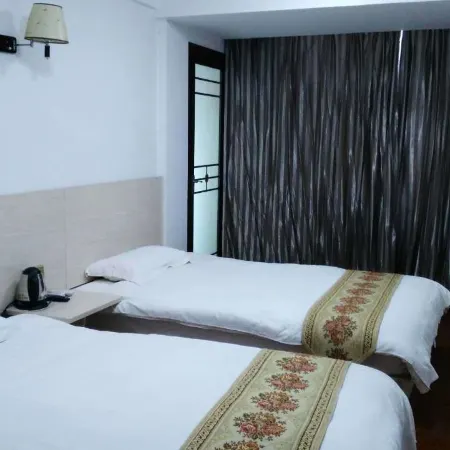 Yiyue Hotel Отели рядом с достопримечательностью «Библиотека Сианьского нефтяного университета (Юйуйский кампус)»