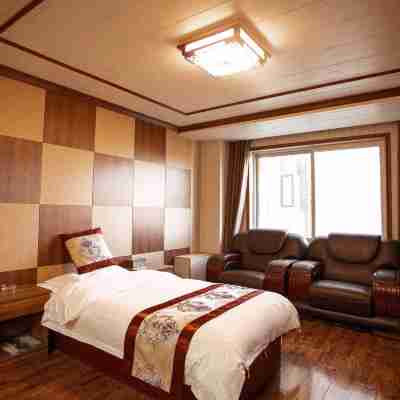 龍裔酒店（靖邊政府廣場店） Rooms