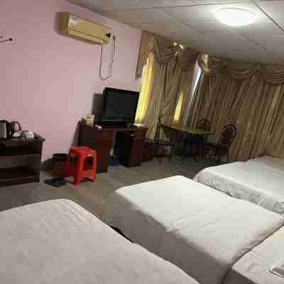 Huanghui Business Hotel (Renhe Road) Rooms