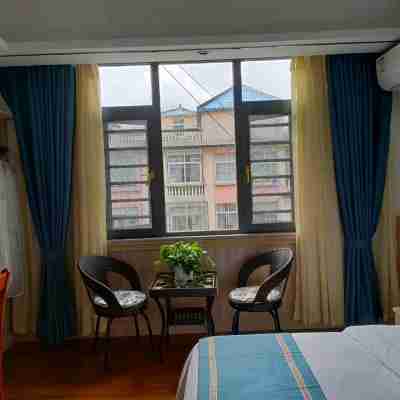 墨江千仟酒店 Rooms