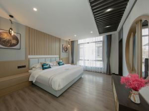 Yuanmou Yuanxing Business Theme Hotel