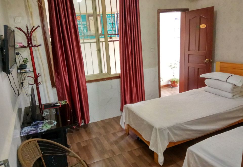 Panzhihua Yujia Guest House - Housity