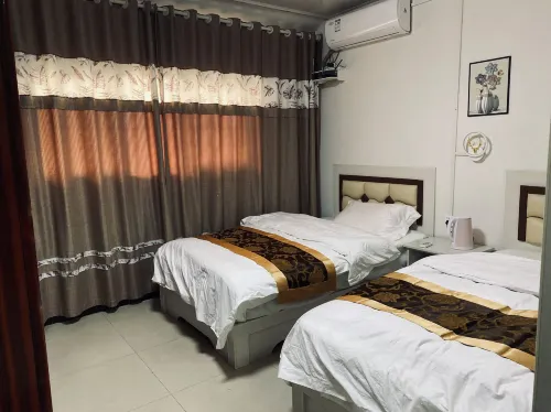 Longzhu Hotel - Inns