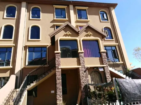 Luliang next door Laowang Light Luxury Homestay Отели в г. Лулян