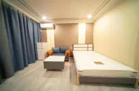 Jiaheyi Boutique Apartment - مطابخ