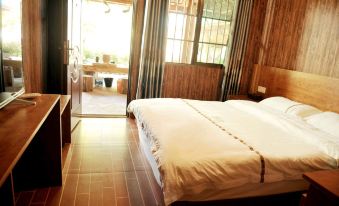 Jinghong Huayao Dai Farmhouse Chinese Inn