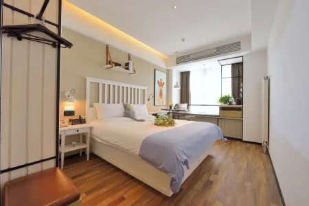 Jingsu Hotel (Jinan Changqing University City Commercial Street Branch) Отели рядом с достопримечательностью «Qilu University of Technology Library»