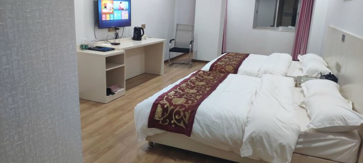 Jinyu Business Hotel Hotel di Longchuan