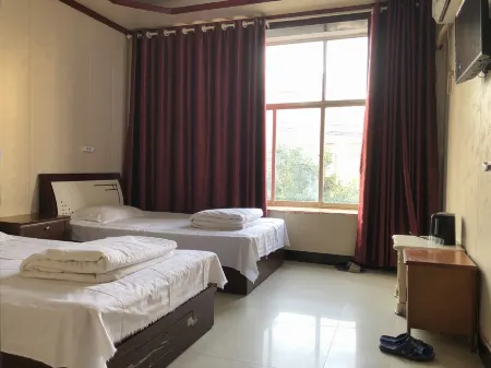 Xihua Youyi Hotel Отели рядом с достопримечательностью «Jizi Reading Platform»