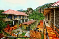 Beijing Tianmen Shanchuanli Homestay (Qinglianggu Branch) Hotel berhampiran Qutan Pond